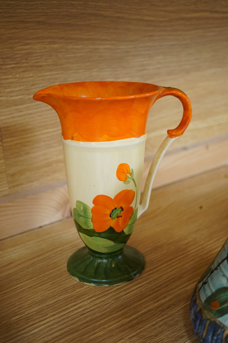 A Beswick woodpecker, two Myott jugs and two Wedgwood teapots and covers, largest 22cm